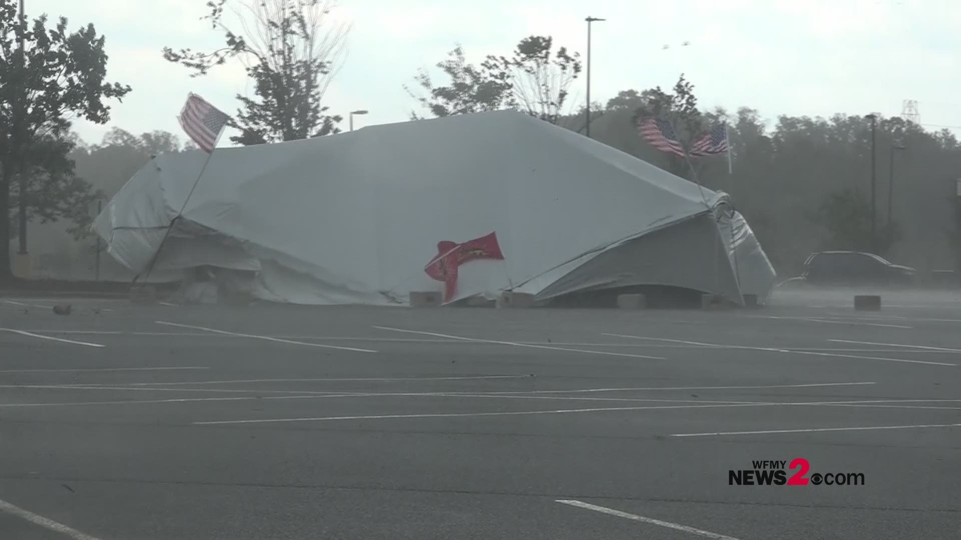 Wild video captured by WFMY News 2 shows a fireworks tent outside the Walmart at Pyramids Village as the storms moved through. High winds caused the tent to cave in and almost blow away during the storm.