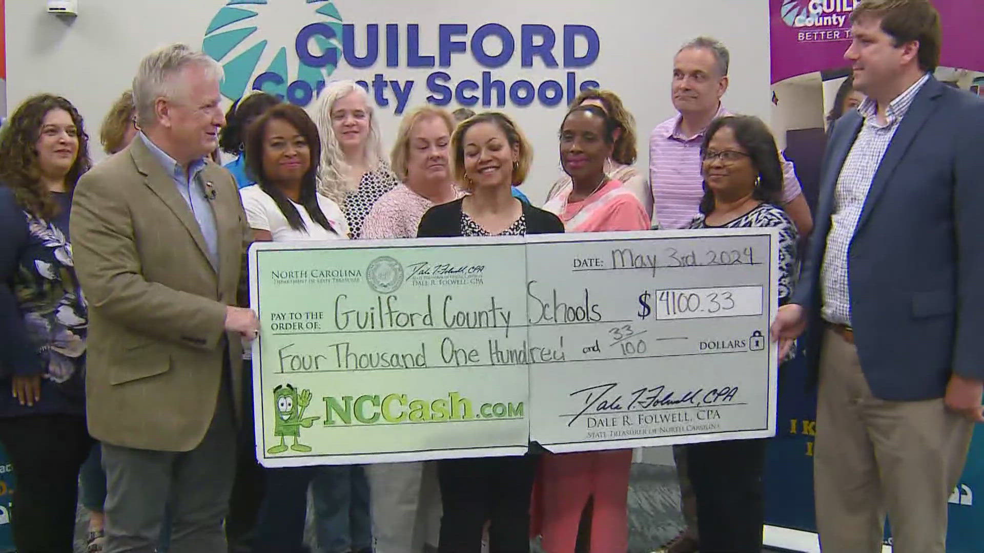 Treasurer gives unclaimed cash to Guilford County Schools.