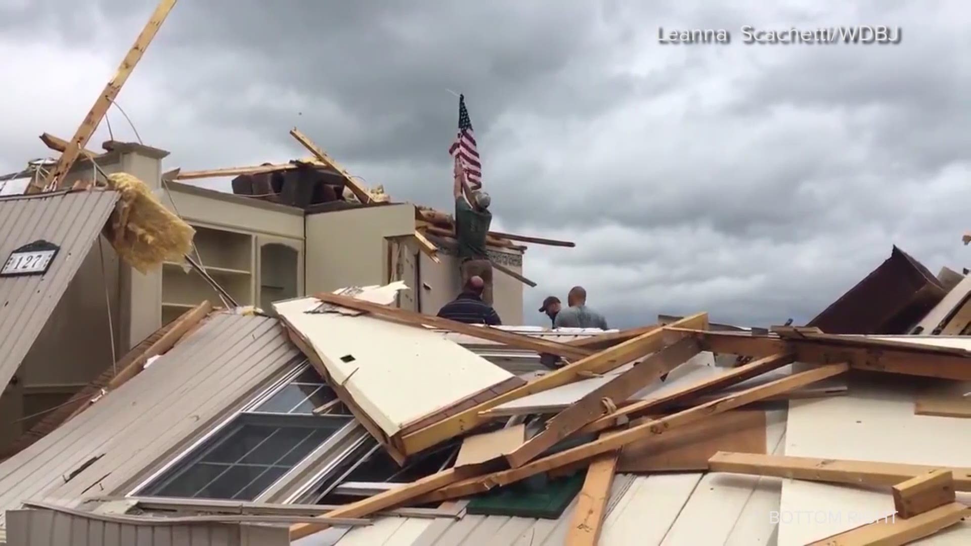 An American Flag was the only thing left standing after a devastating tornado hit in Franklin County, Virginia. Four men worked to rescue the flag from the home as the Leanna Scachetti captured it all on video.