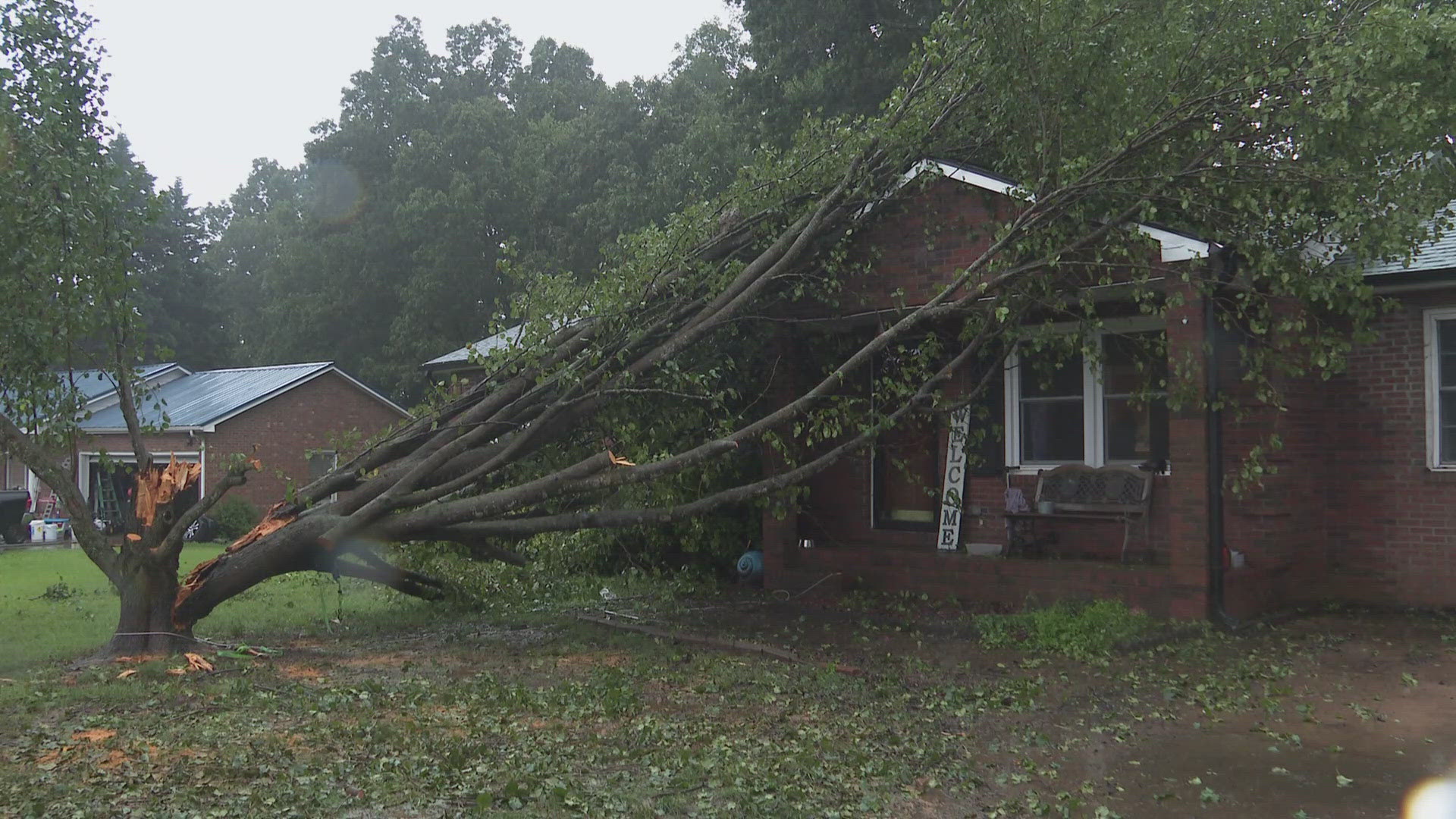 The Elmores are picking up the pieces after Tropical Storm Debby toppled a huge tree onto their home in Randleman.