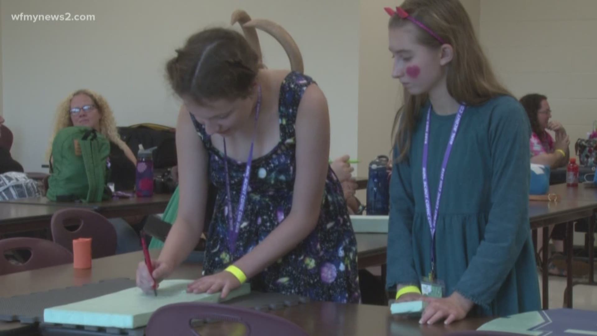 Girl Scouts Learn New Skills At Comic Con