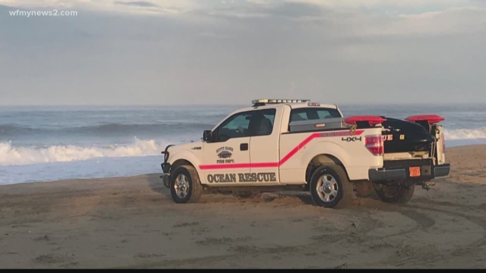 A boy was swept away while walking along the shore with his mother when a wave crashed in and swept him away.