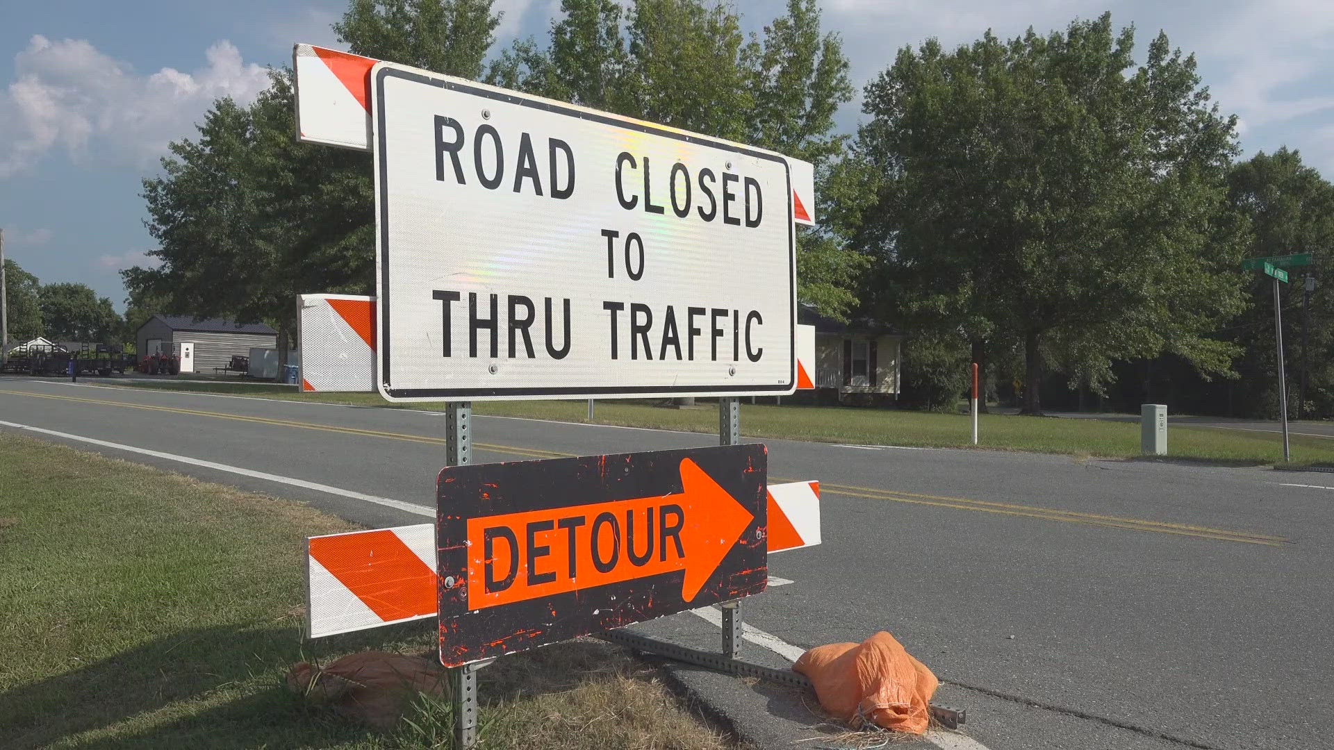 The storm took a chunk out of the land underneath Altamahaw Union Ridge Road.