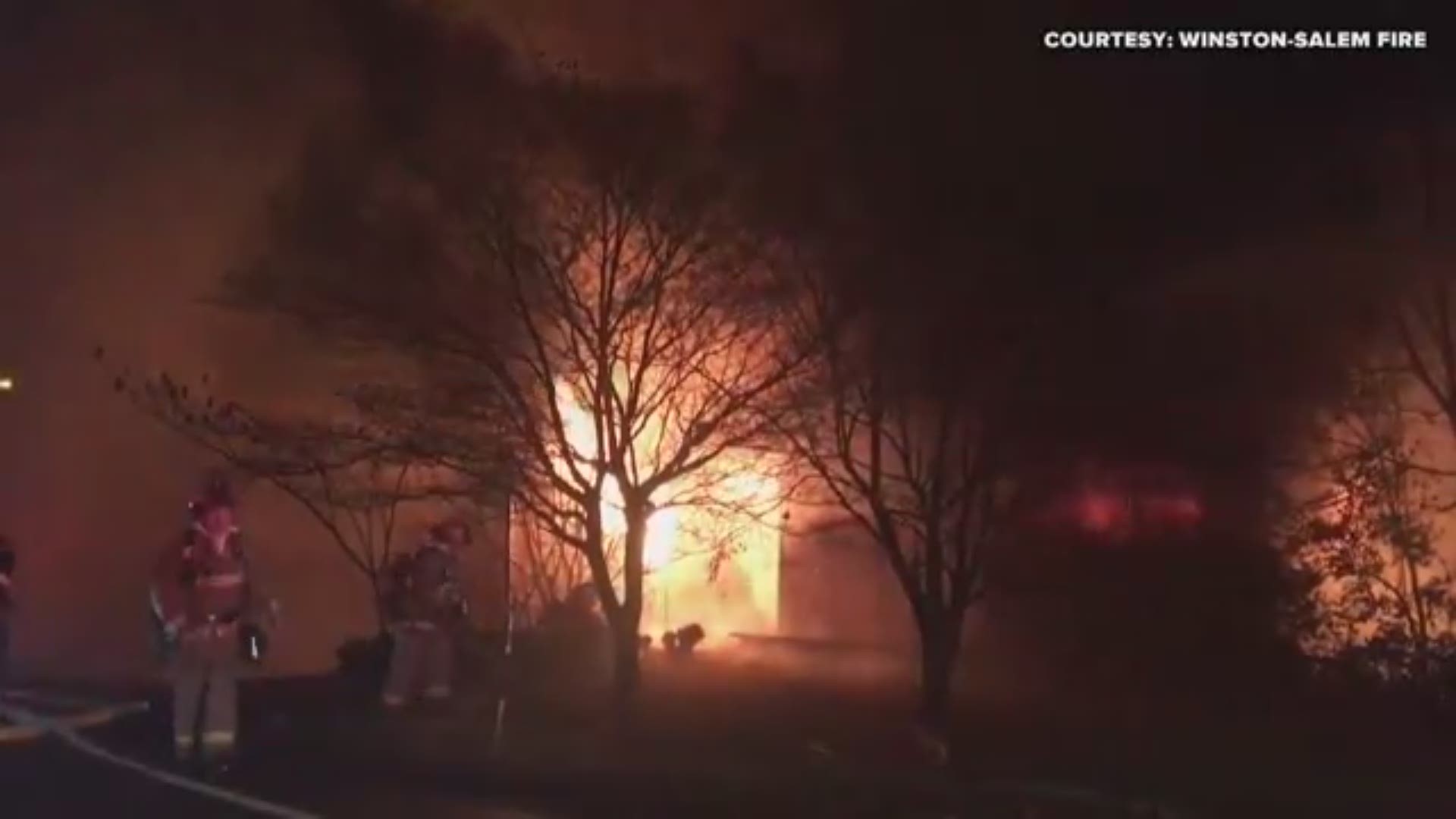 Winston-Salem firefighters captured battling a house fire on Tech Avenue.