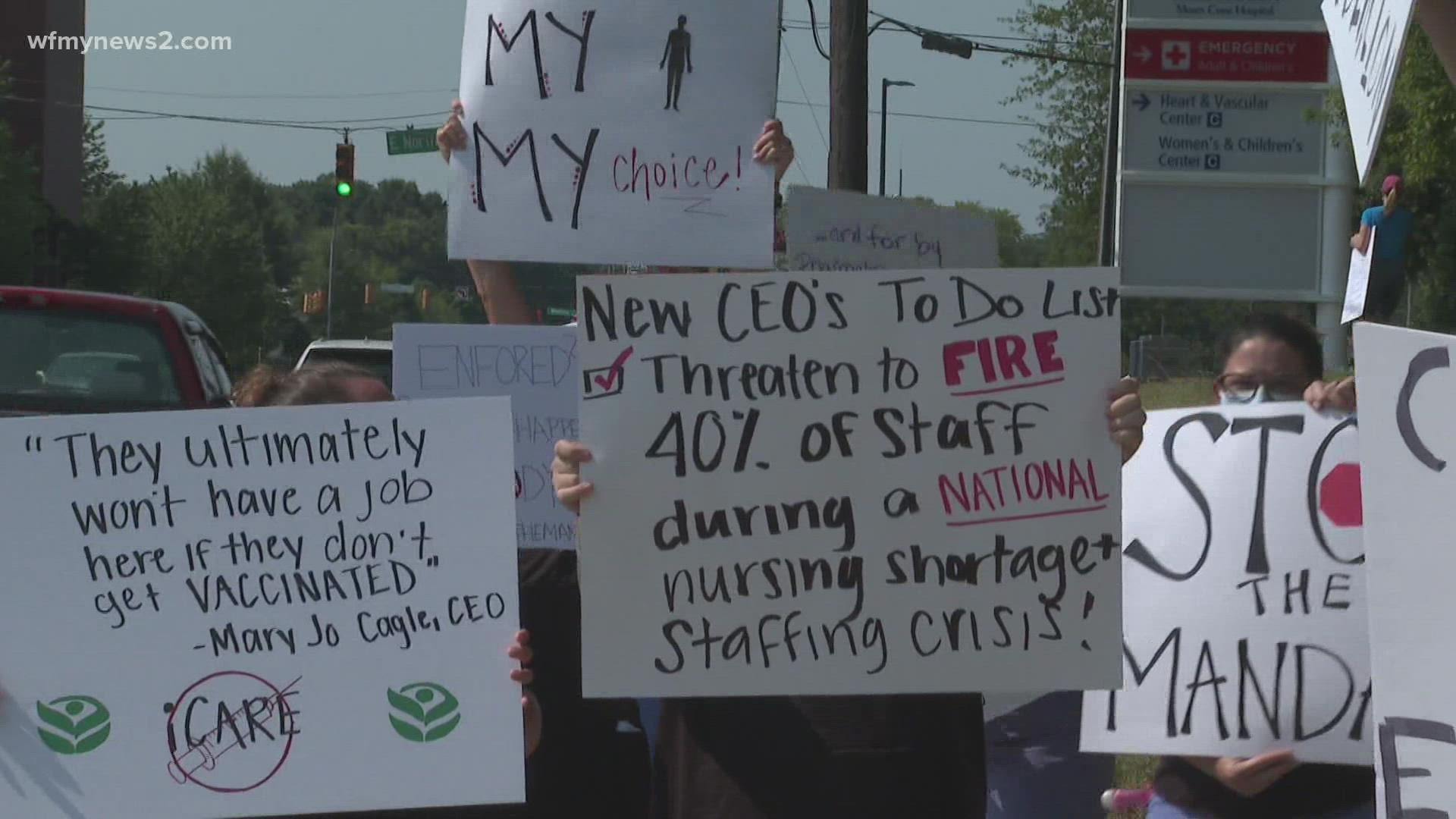 Cone Health employees against the vaccine mandate were protesting in front of the hospital Thursday.