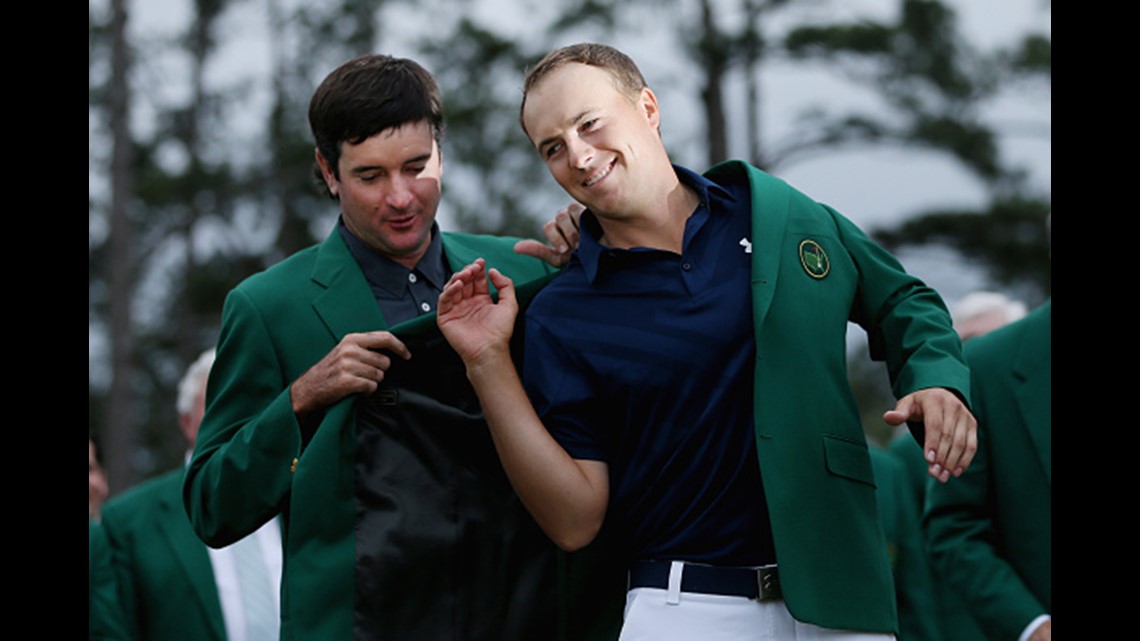 a green jacket is placed in a chair along the 1st tee in honor