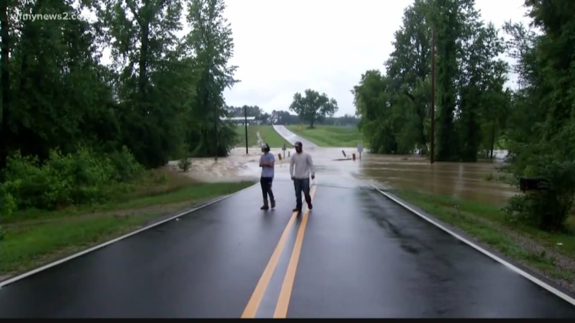As showers continue across the state, floodwaters consumed many streets and roads.