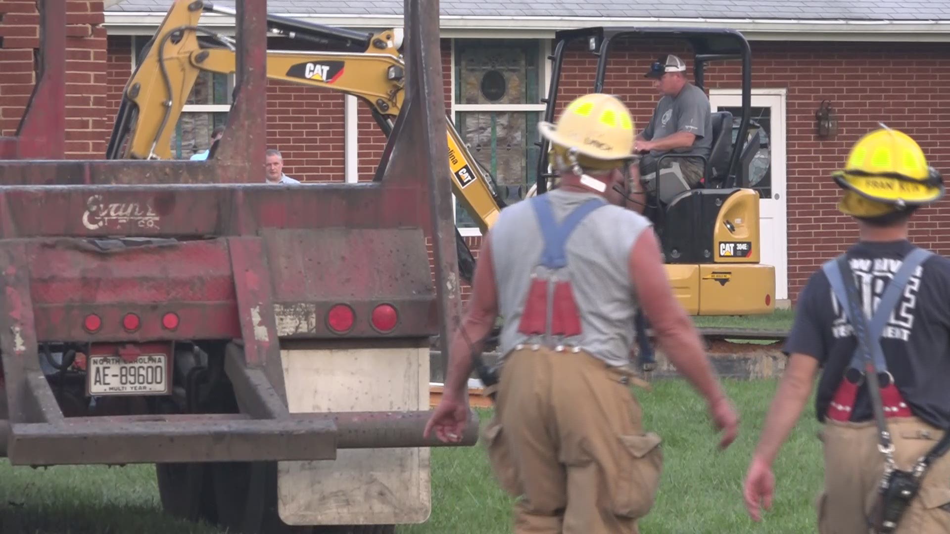 Behind the scenes as emergency crews clean up after a logging truck crashes into a church