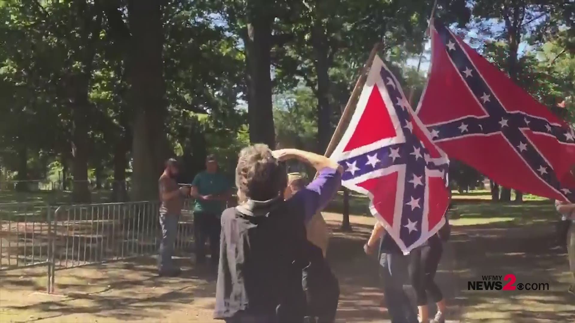 Supporters and opponents rally at Silent Sam statue site in Chapel Hill.