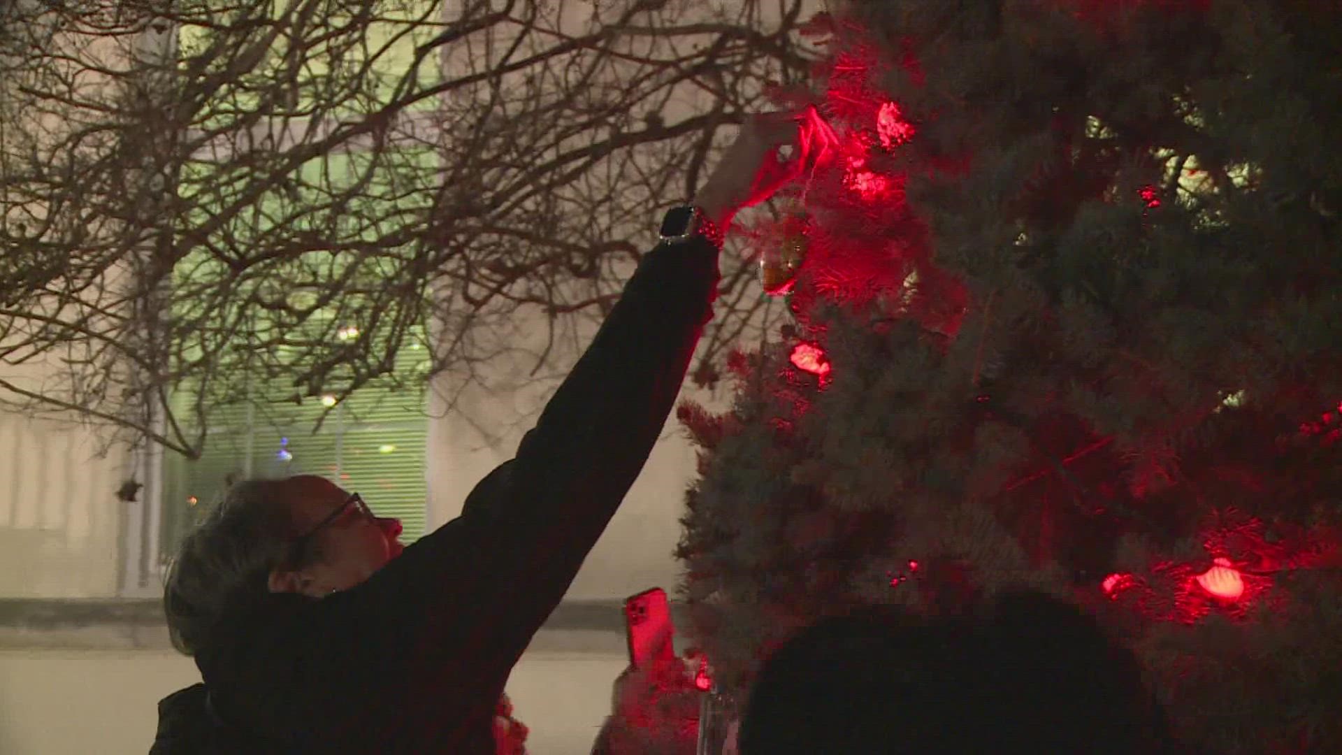 The lighting of the Christmas tree was in honor of lives lost to traffic crashes in the last year.