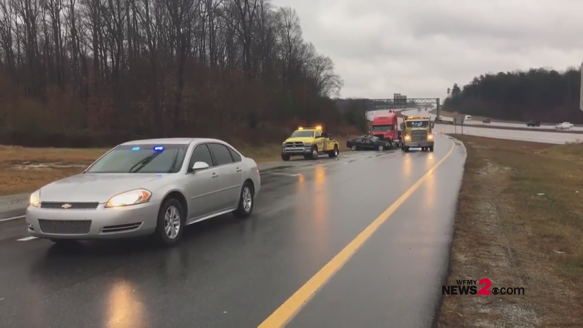 Greensboro Police say a tractor-trailer hit Matthew Craver's car after he swerved into the median and traveled back across the highway.