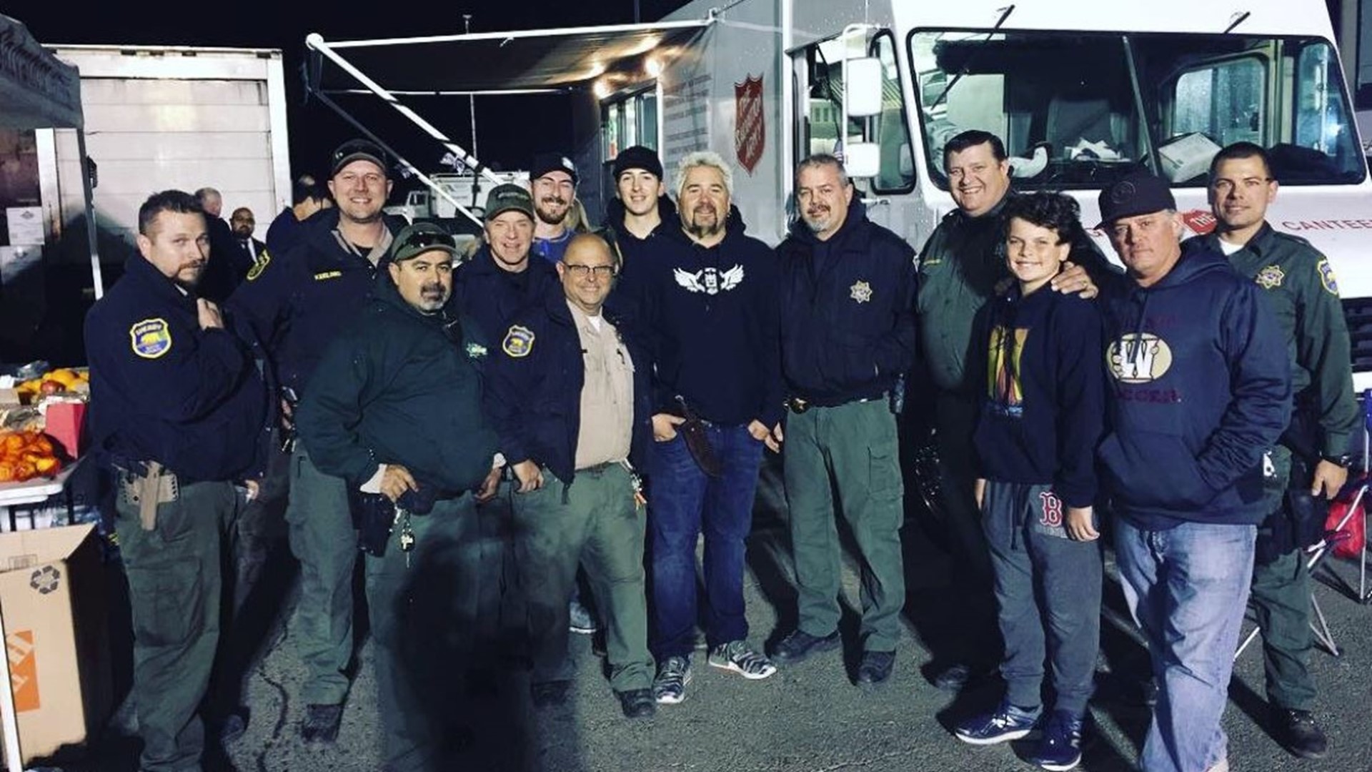 Guy Fieri Helps Cook, Serve Dinner For Camp Fire First Responders
