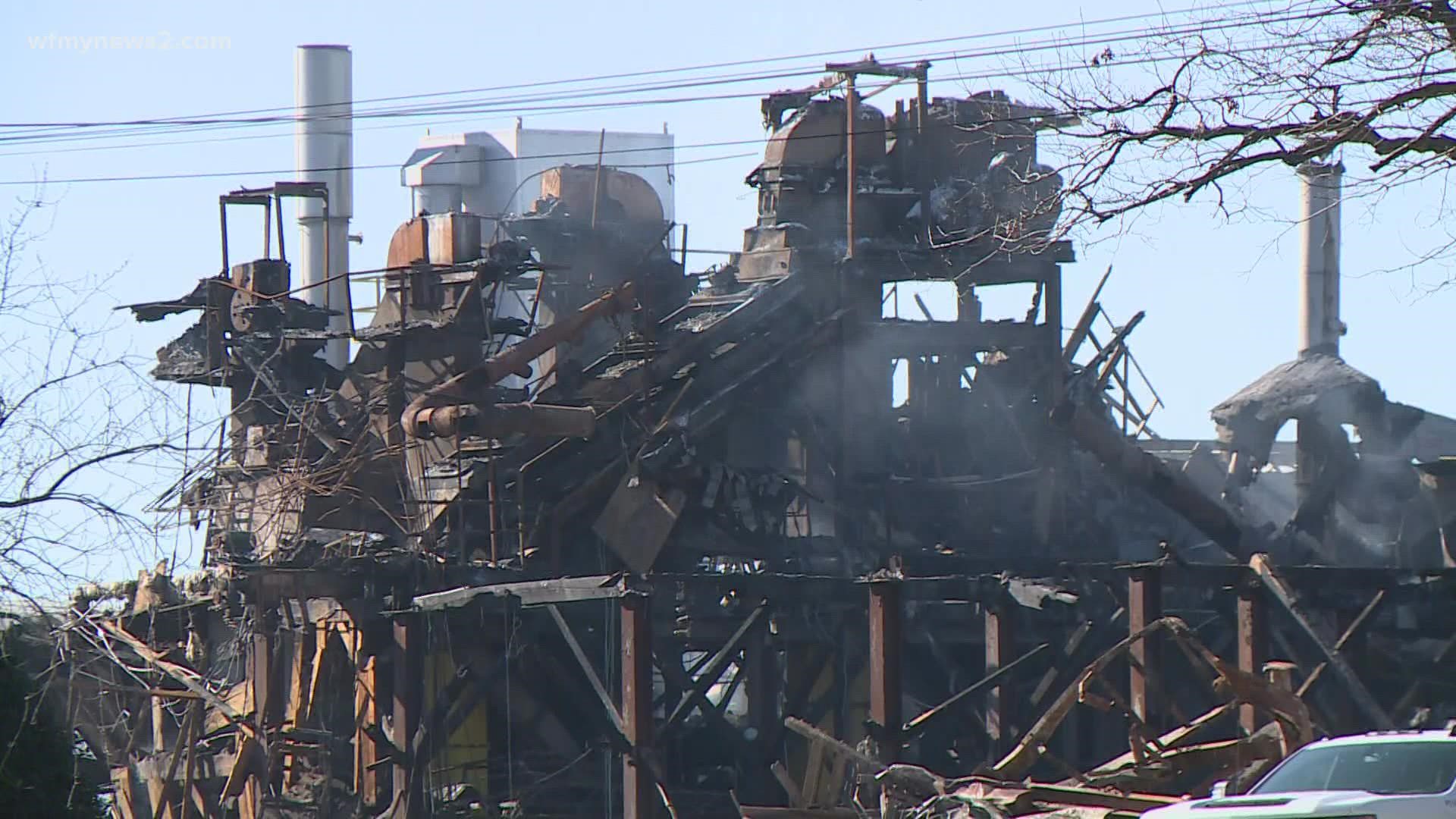 Community talks about relief options during Weaver plant fire townhall meeting.