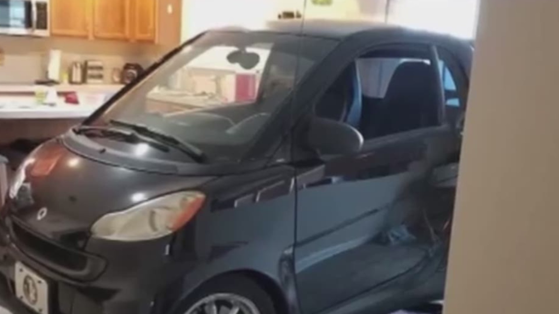 Patrick Eldridge parked his smart car in his kitchen to protect it from Hurricane Dorian because he didn't want it to "blow away" and to prove that he can park his car there. With the car in the middle of the kitchen, his wife Jessica Eldridge had to move around it to cook and serve dinner.