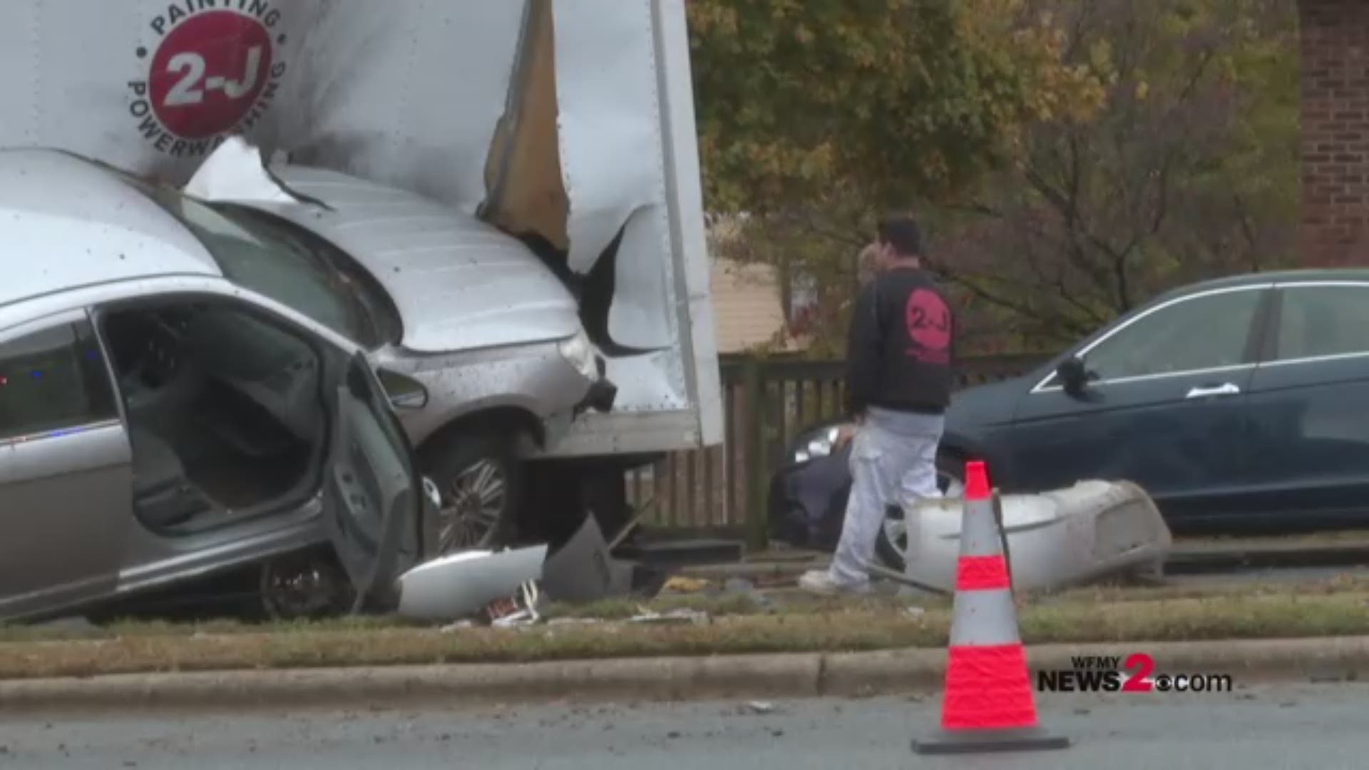 Greensboro Police said a car lost control at the intersection of Cone Boulevard and Lawndale Drive before hitting a box truck.