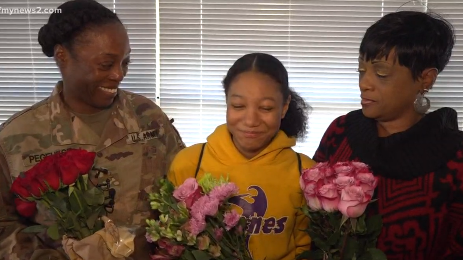 "I wanted to surprise my daughter at school," said Major Pegeuese. "At the same time, I also wanted to surprise my mom." Staff at Hanes Magnet School disguised it as a "Volunteer of the Year" ceremony.