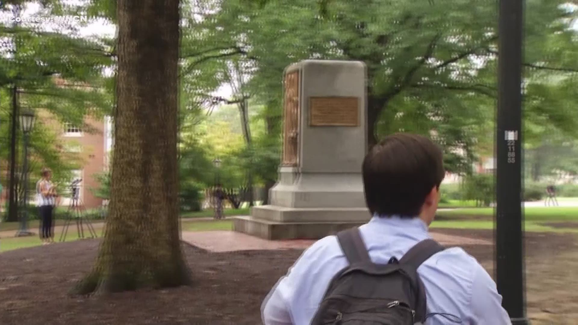 Students react after the toppling of Silent Sam.