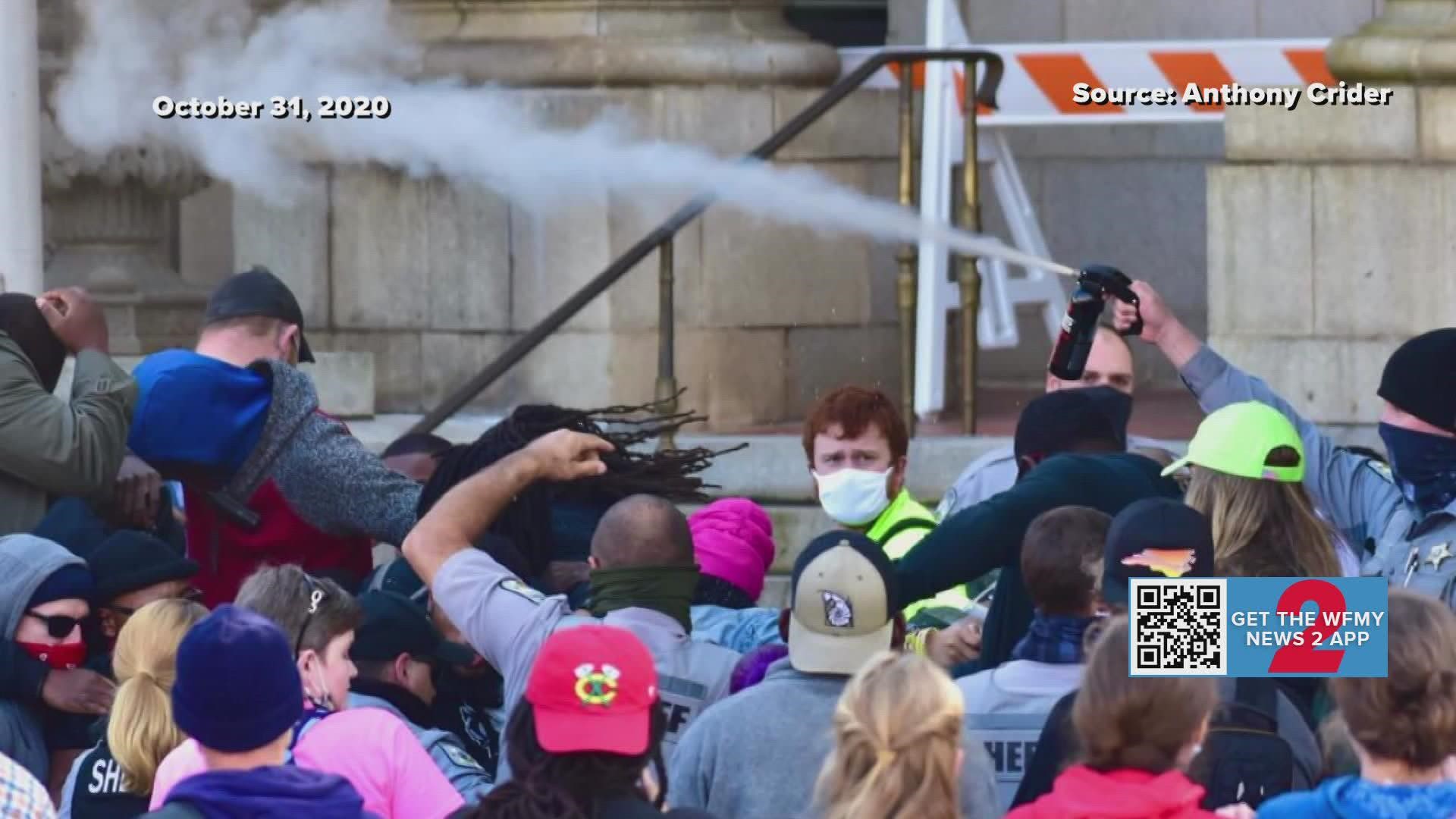 The 2020 March to the Polls rally in Graham ended with officers pepper-spraying people. The two sides settled a federal lawsuit almost two years later.