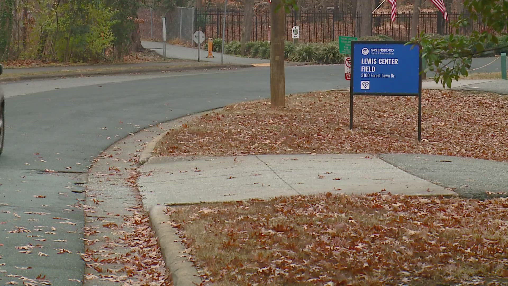 Police swarm busy park looking for gunman after drive-by shooting sends one to the hospital.