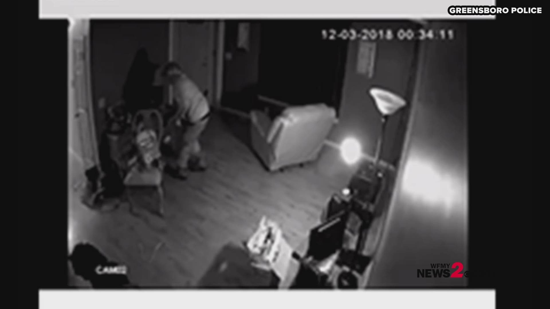 Investigators said on December 3, the man broke into the house on Markham Road in Greensboro but stole nothing. Surveillance photos captured the man walking around the house to check out various rooms.