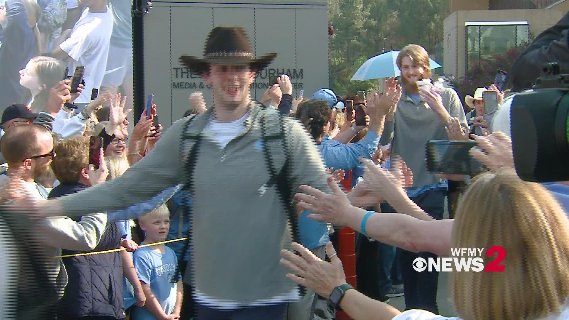 UNC fans cheer on the Tar Heels before they leave for New Orleans.