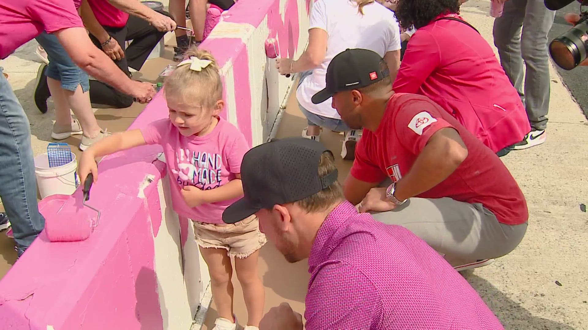 The pit walls are now bright pink as a show of support to those battling the disease and those who have survived.