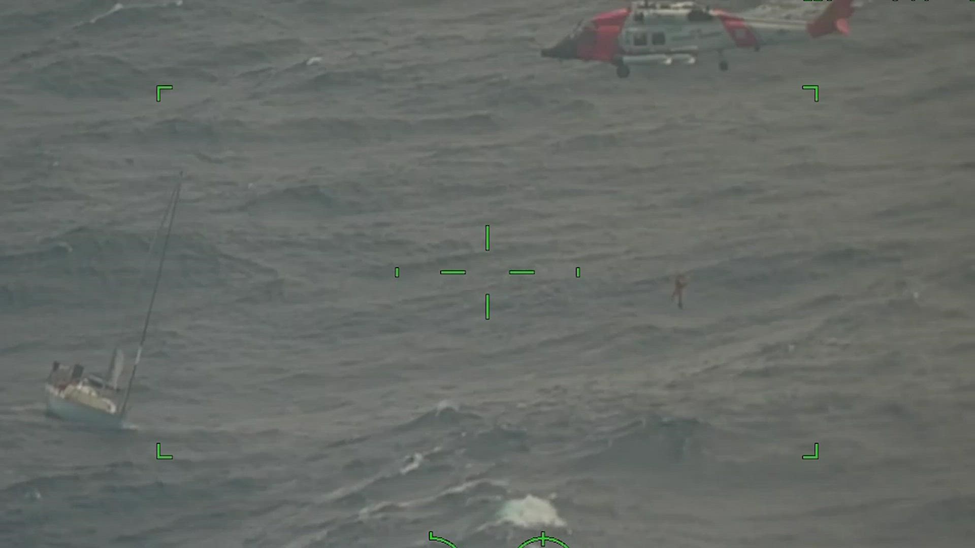 The U.S. Coast Guard rescued two people from a distressed sailboat near Cape Fear, North Carolina. Video Source: U.S. Coast Guard