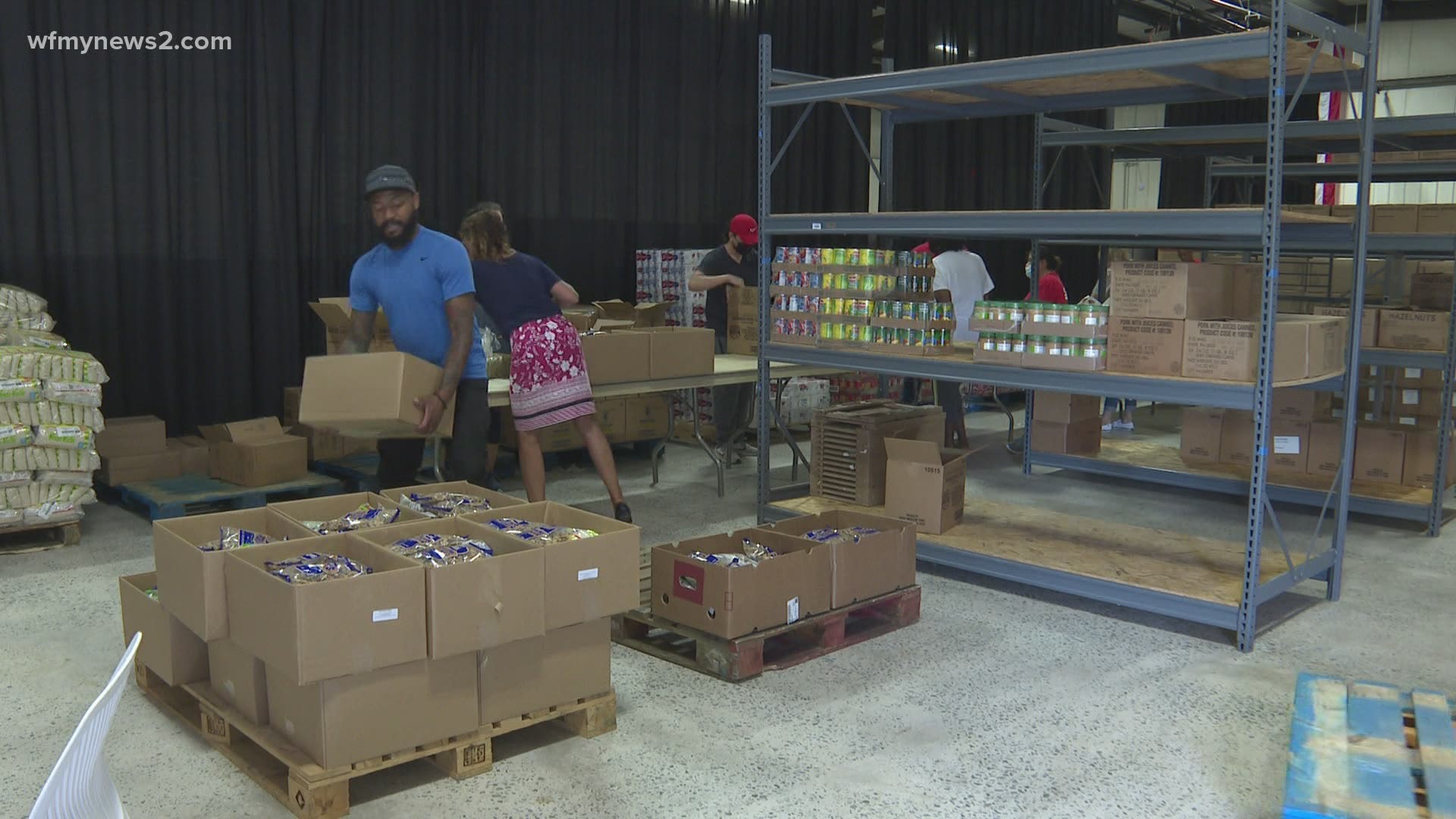 Members of Definition Church, formerly known as Daystar Church, pack boxes to serve to the community.