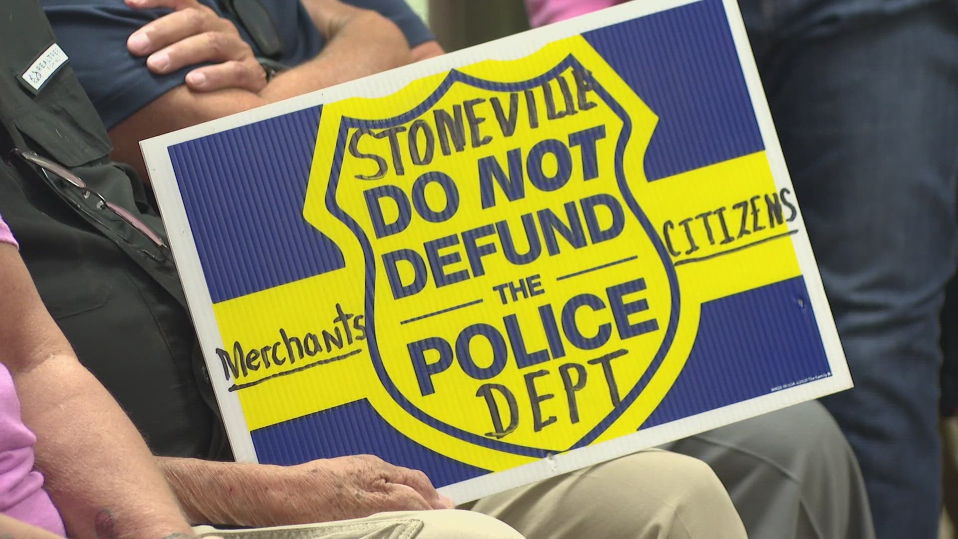 Citizens erupted in cheers as the town council made the decision to keep its police department.