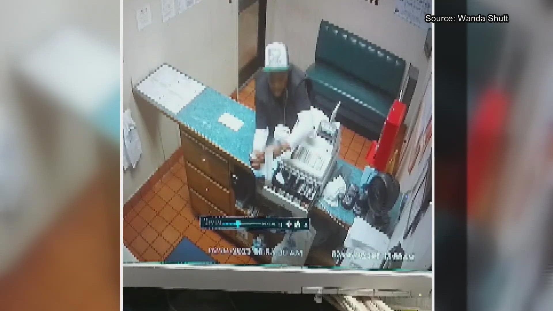 A man steals a wad of money from a cash register at Mayflower in Asheboro after asking an employee to grab something from the back.