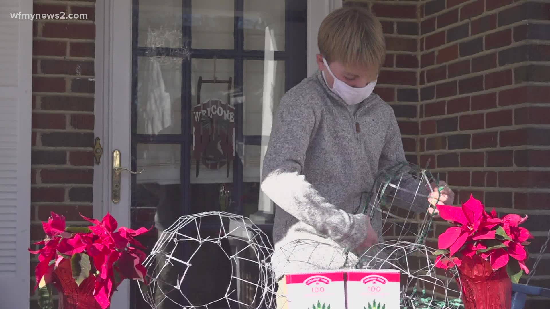 An eighth grader started a holiday ball business to start his college fund and help a local charity.