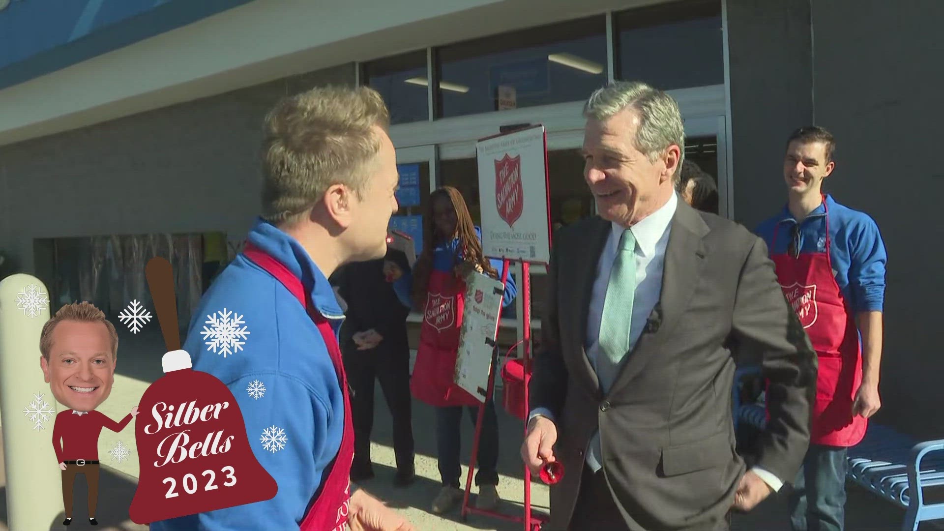 Governor Roy Cooper visits the Walmart at Battleground Avenue for the first stop of the Silber Bells tour.