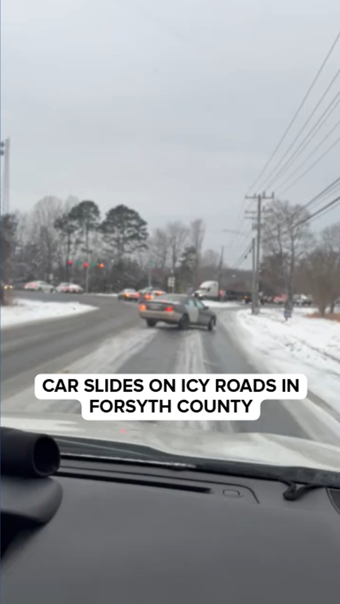 WATCH: Reporter captures car losing control on icy roads in Forsyth ...