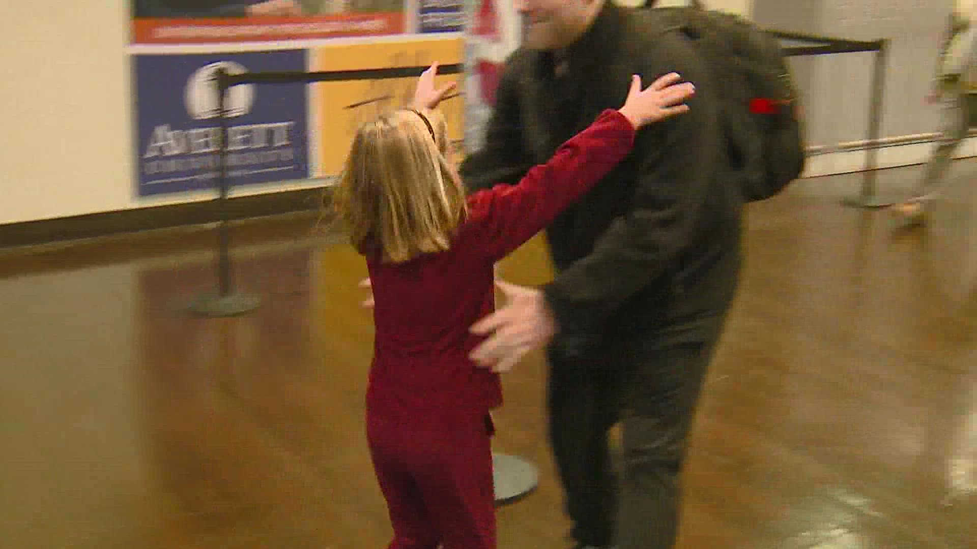 During the busiest travel day of the year, families reunite in airports across the country.
