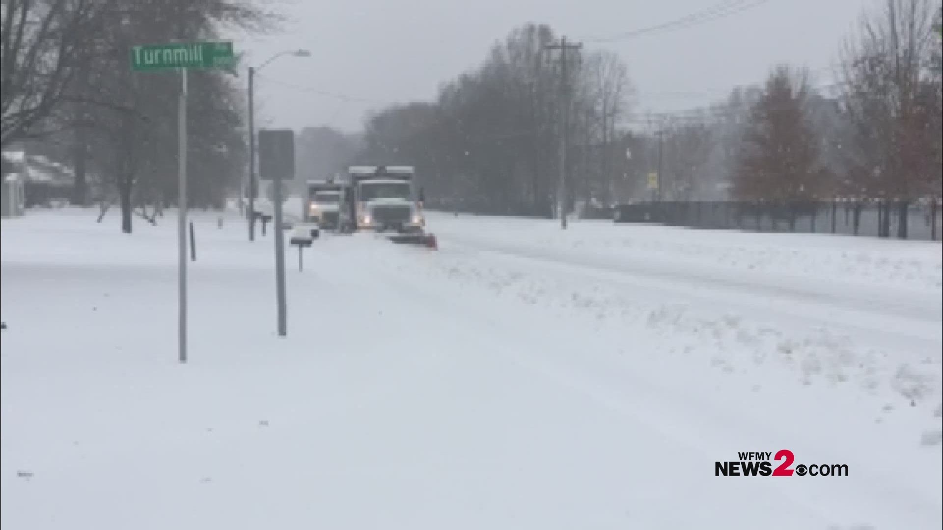 City of Greensboro snow plows out and about working to clear the snowy roads.