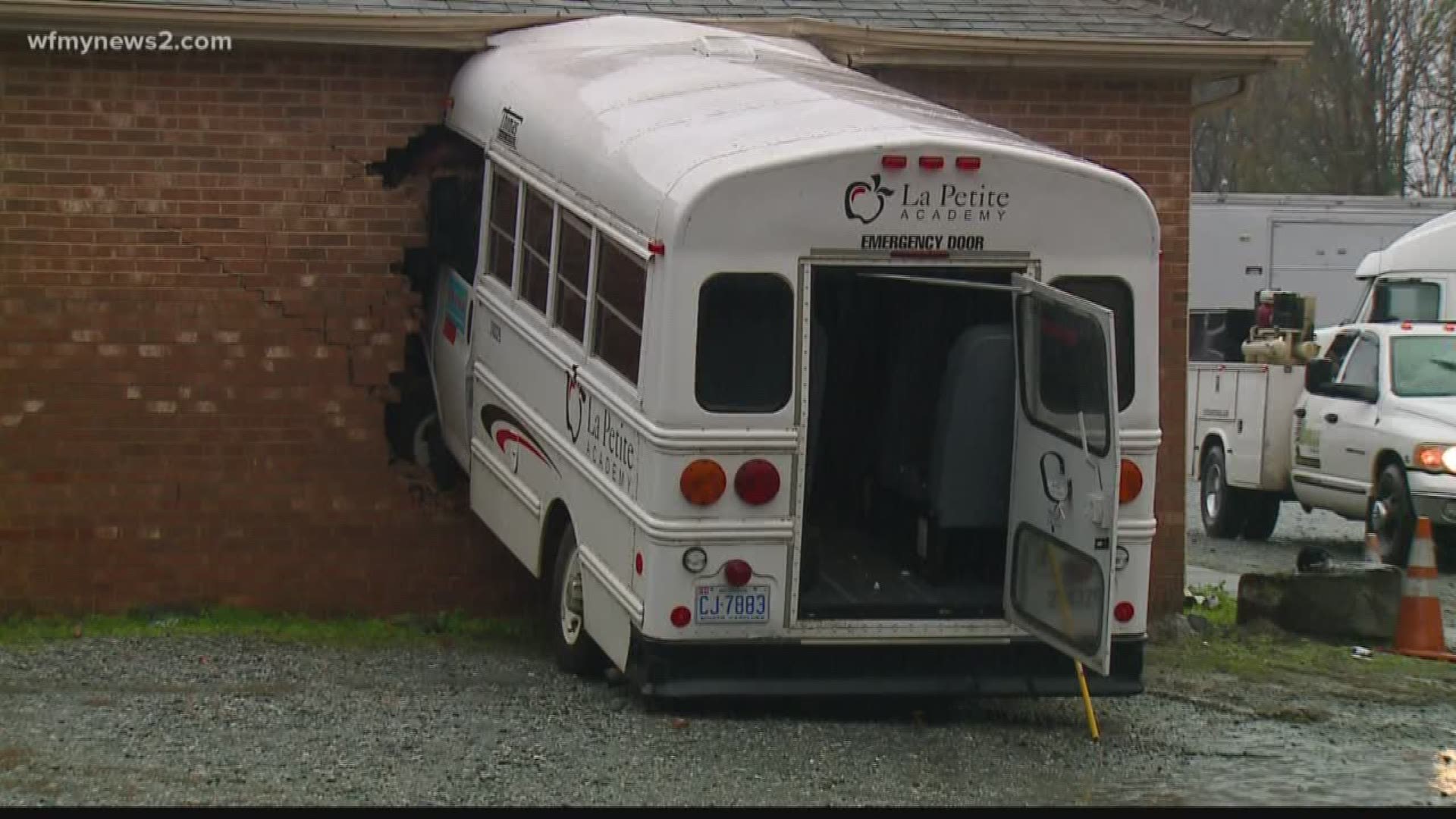 Bus carrying kids crashes into building. Neighbors say accidents happen all the time on that road