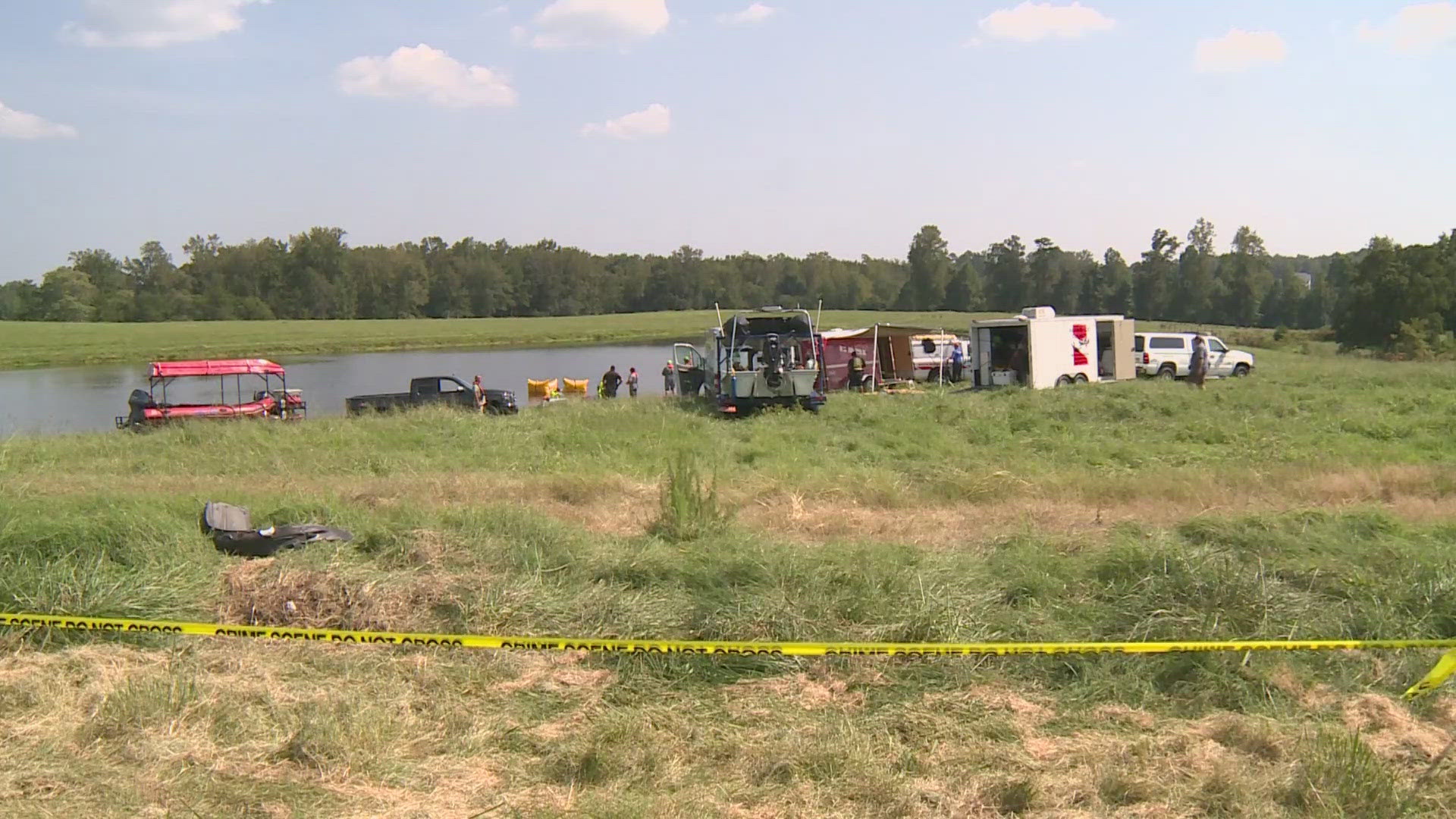 Guilford County EMS say it's unclear how the vehicle landed in the pond.