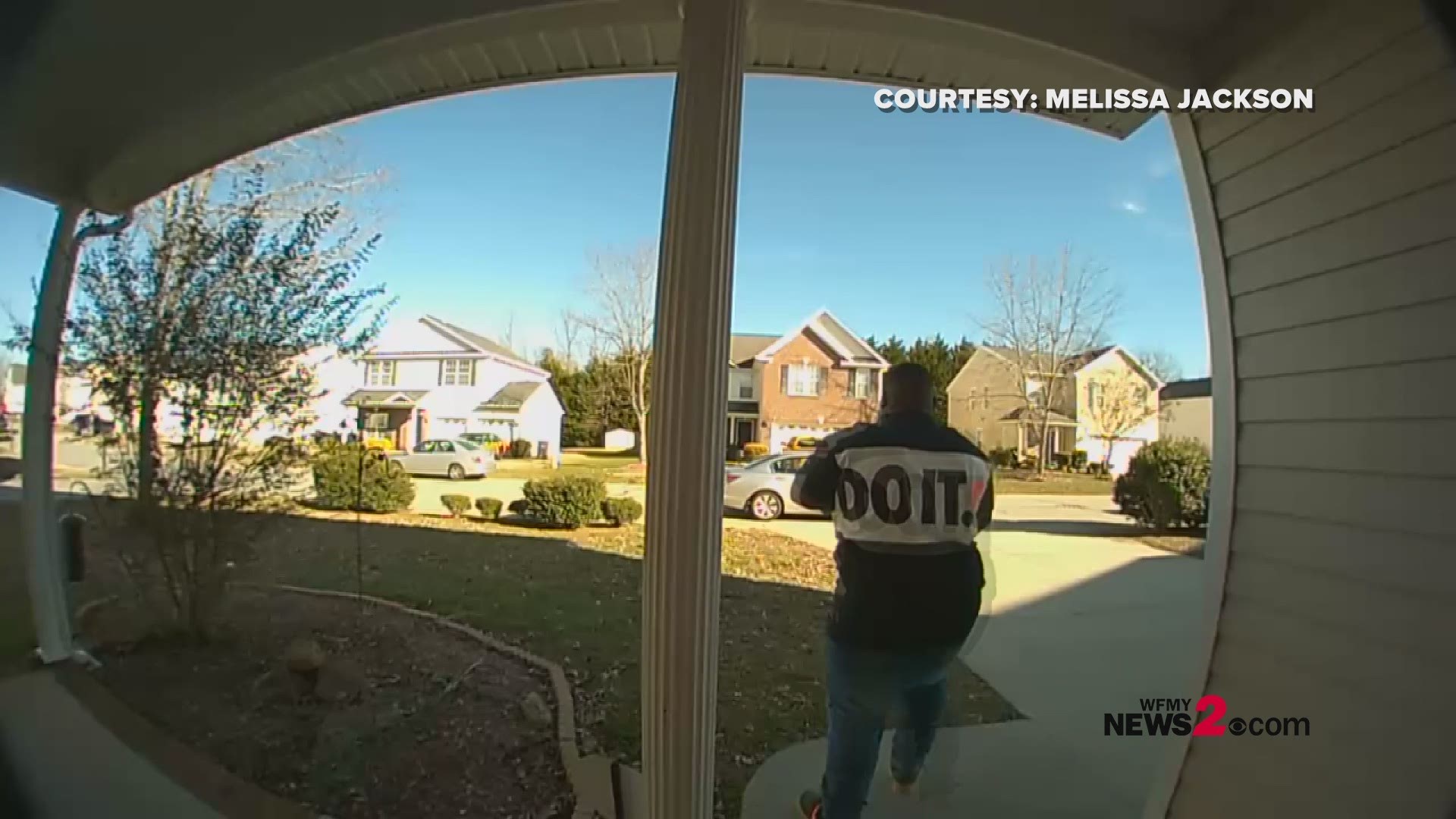 The video from Melissa Jackson's security camera doorbell shows a man coming up to her doorstep, walking away with two medium-sized boxes and getting in the passenger seat of a silver sedan leaving the scene.