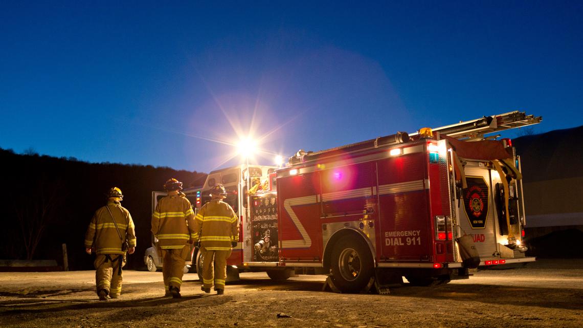 Two firefighters injured after fire truck overturns in Surry County ...