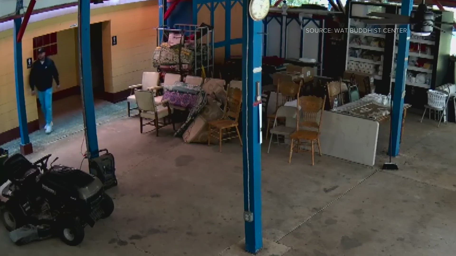 Security video caught the moment when a man and a woman entered a Greensboro Buddhist Center. The head monk says he believes they were trying to steal from them.