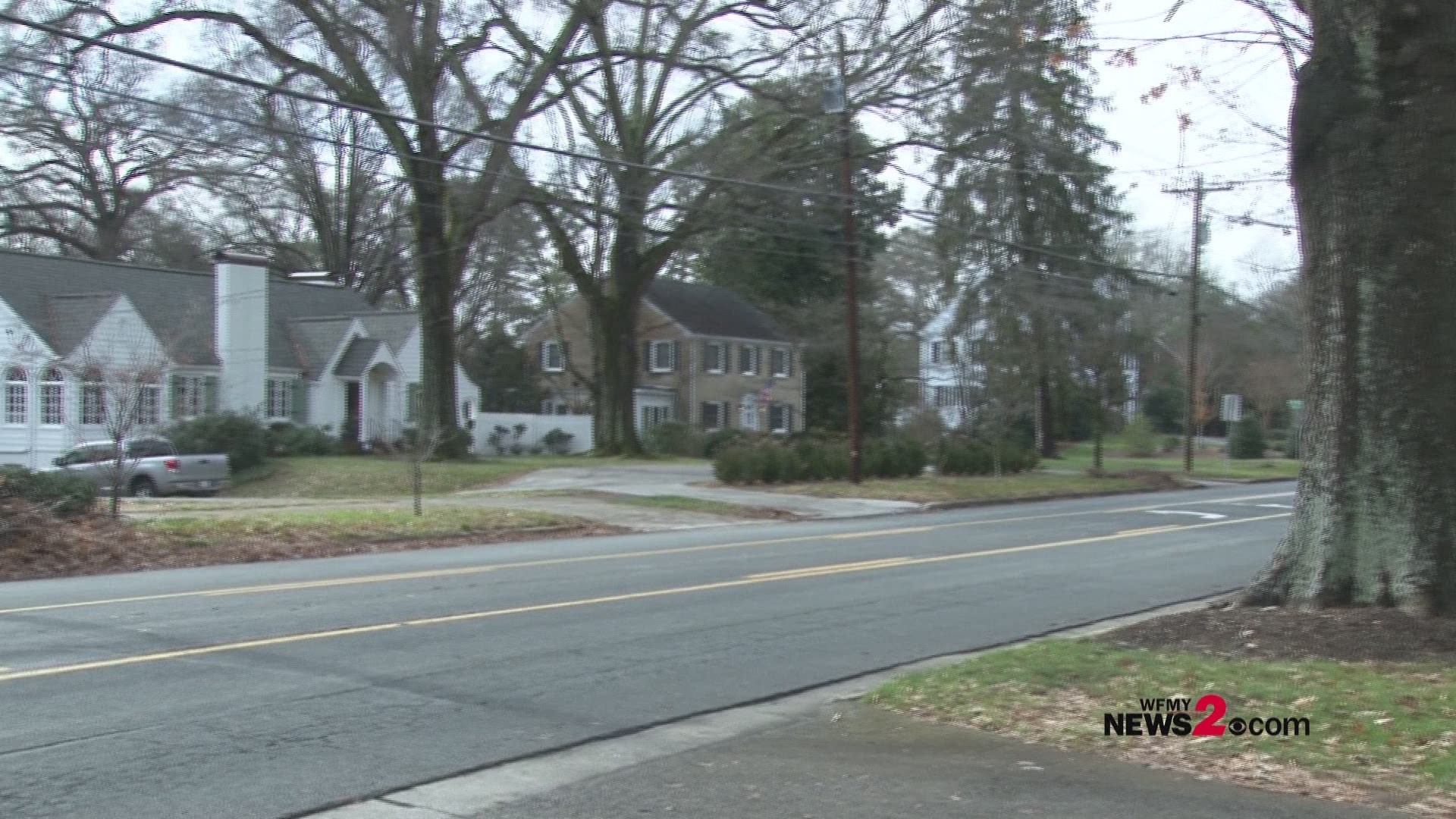 Police say an armed man forced his way inside the house after asking for change.