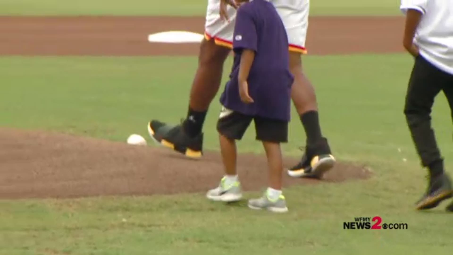 NBA Star Chris Paul throws out first pitch at Dash game.