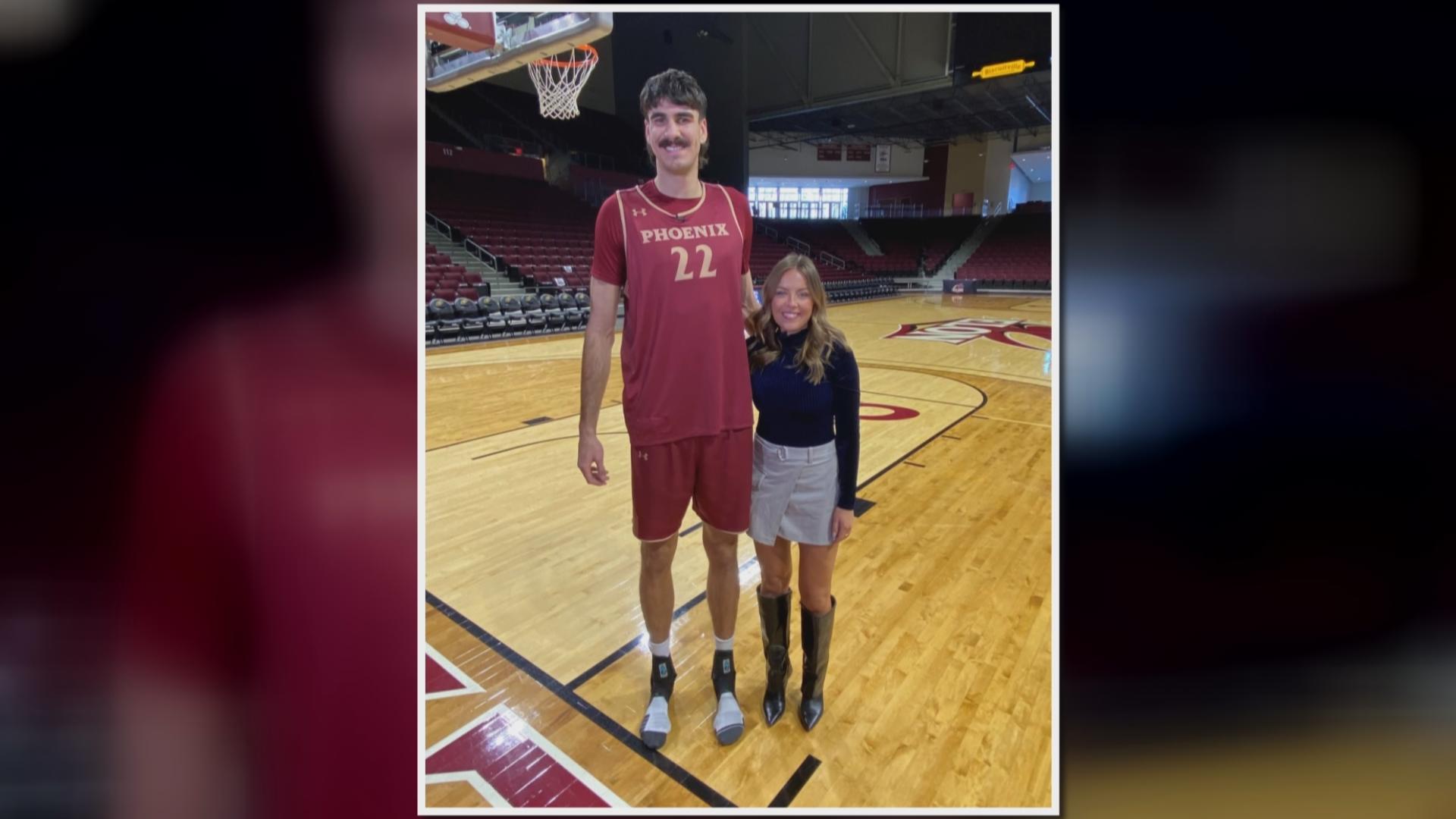 Matthew Van Komen towers over just about everyone he comes across. That comes in handy on the basketball court.