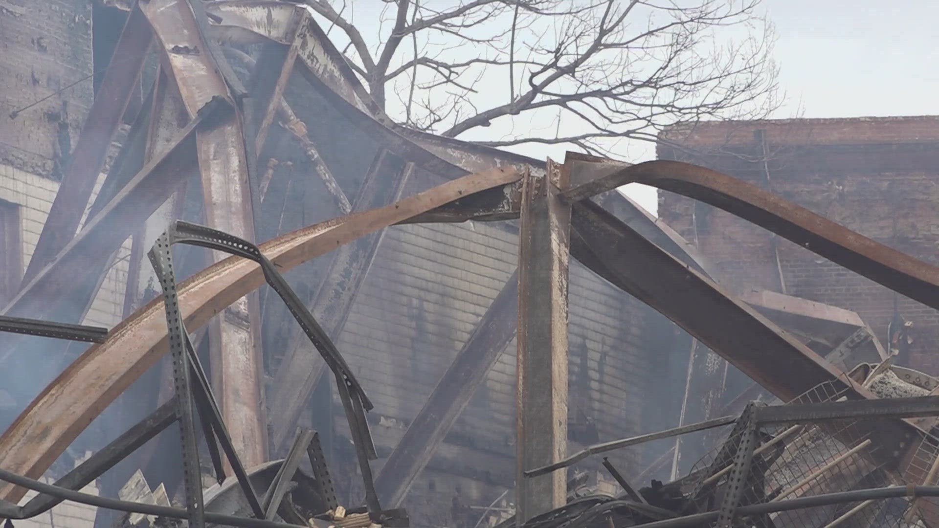 Firefighters are urging people who live near the old Culp Weaving Mill to stay indoors and limit outdoor activities.