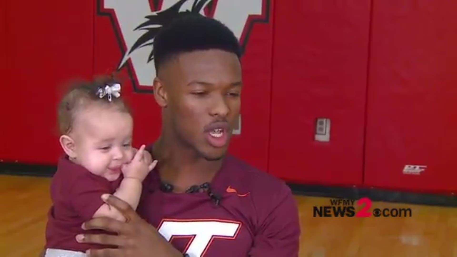 Walkertown High Basketball Player, Jalen Cone makes decision to commit to VA Tech. His daughter Ivy stole the show during the college announcement.