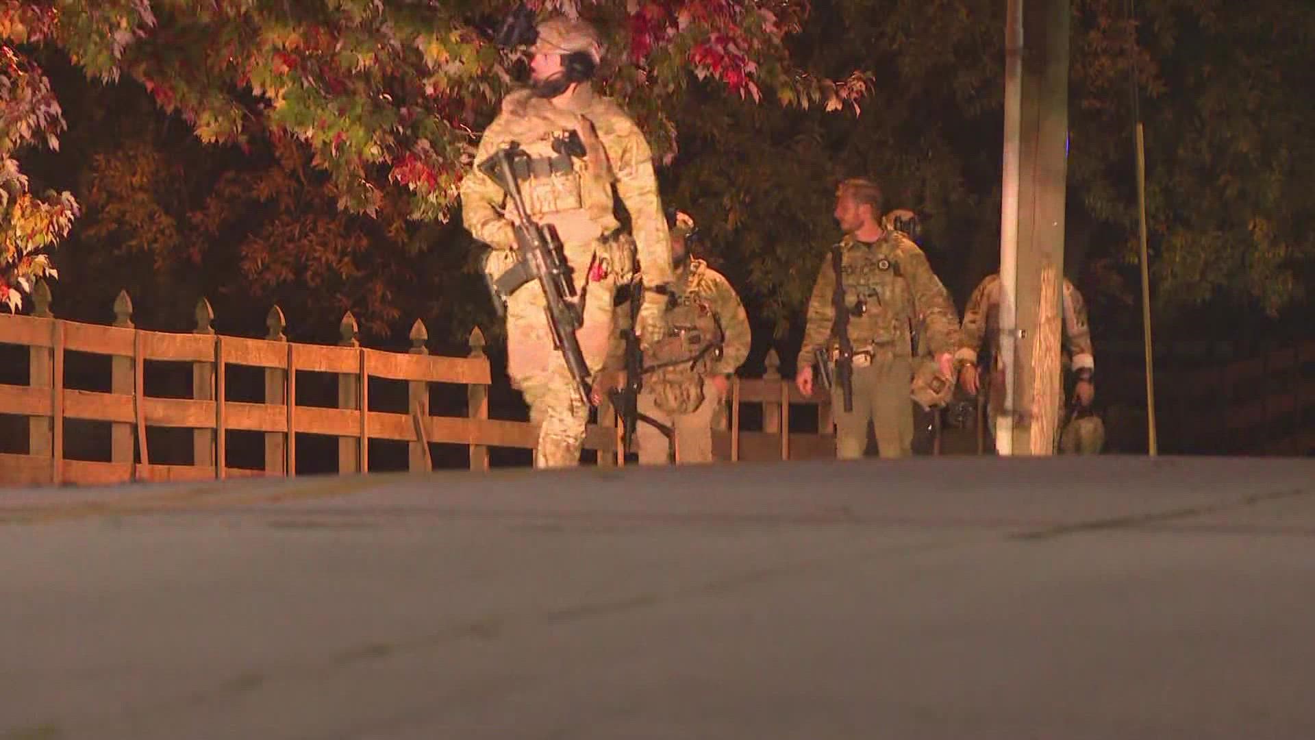 A neighbor across the street captured video of police arresting the suspect in the front yard.