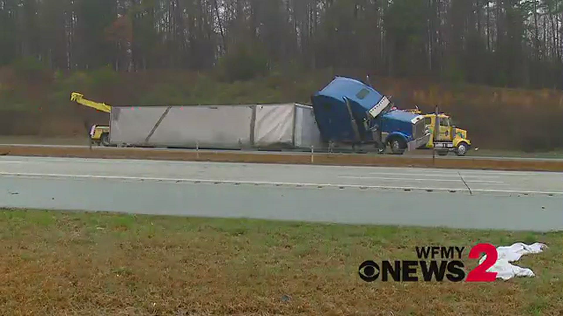 All southbound lanes of I-85 at exit 126 near Greensboro are closed due to an overturned tractor-trailer. No one was hurt.