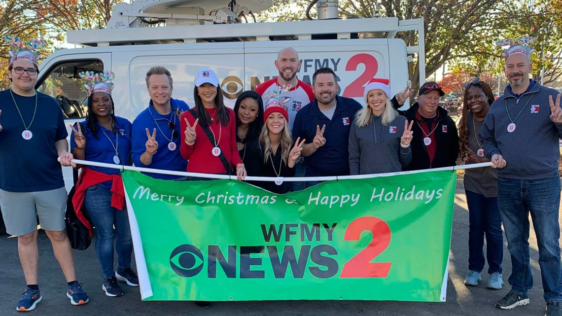 WFMY News 2 crews walking in the High Point Holiday parade