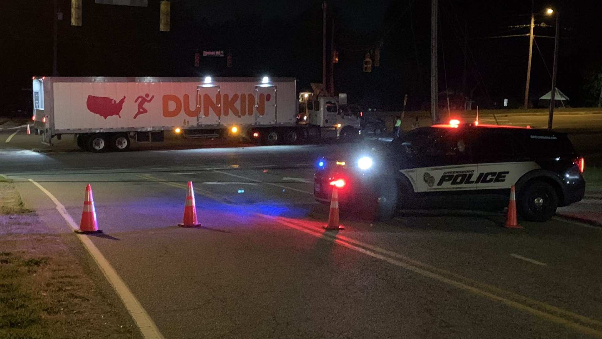 Greensboro police are investigating a crash involving a Dunkin' Donuts tractor trailer