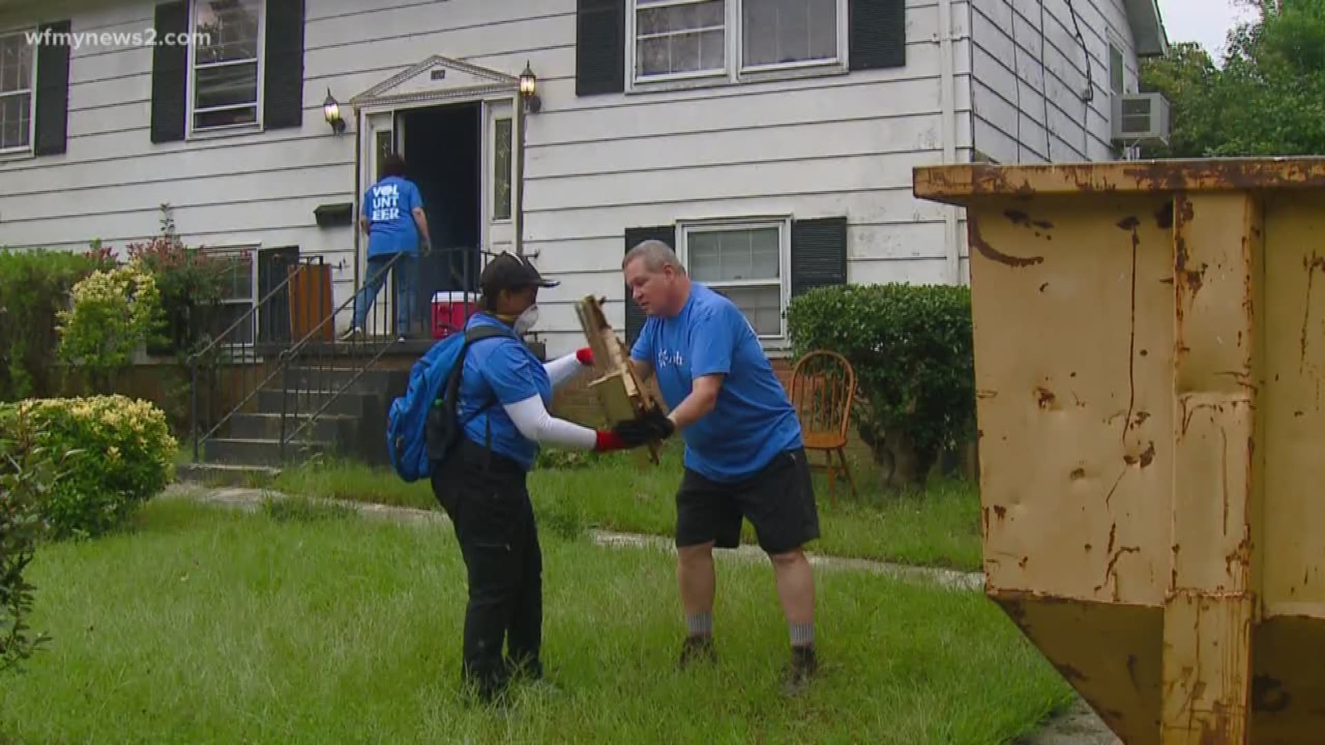 Neighbors Help Work On Tornado-Damaged Homes